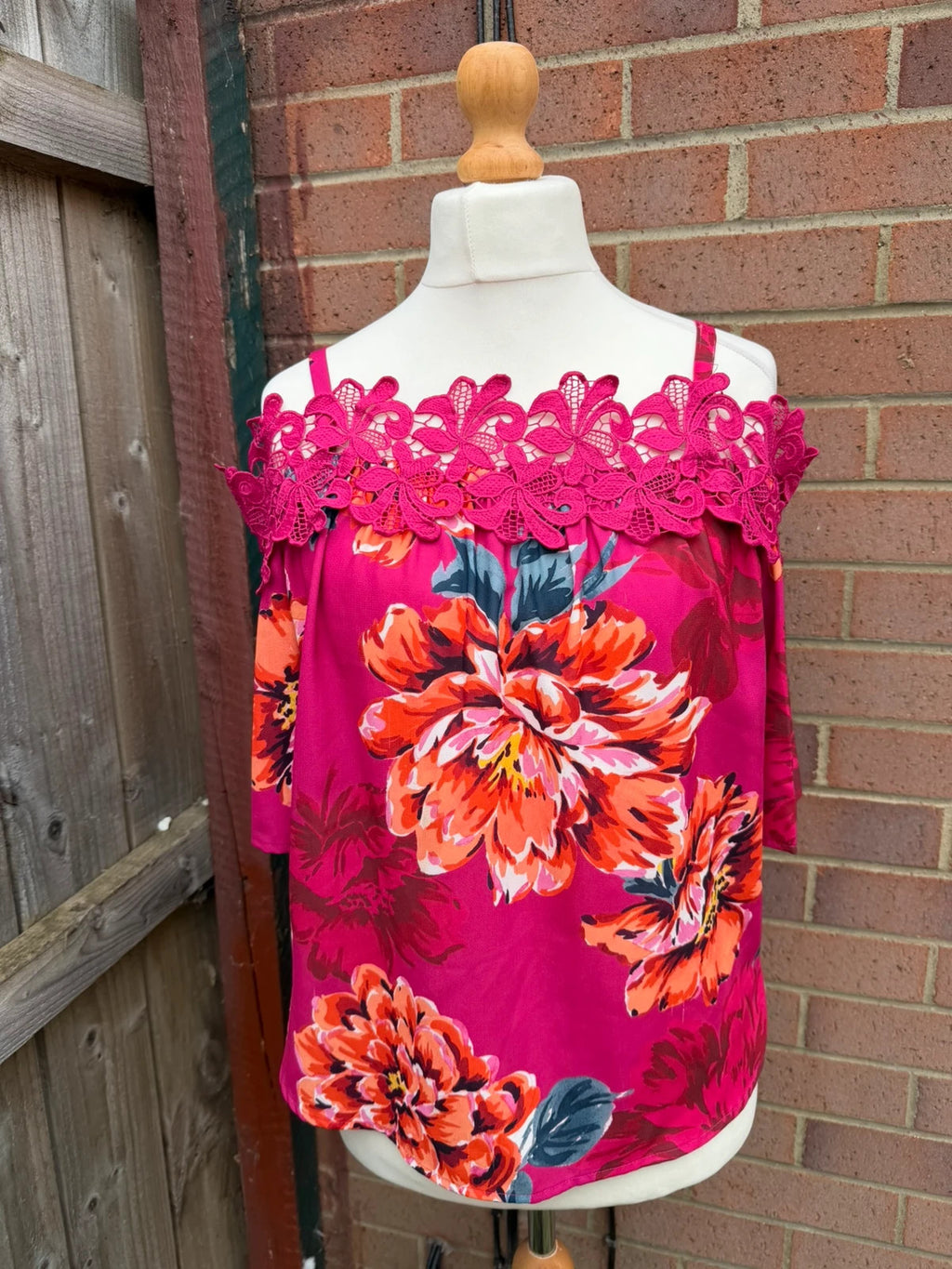 Soon multi off-the-shoulder top with pink floral pattern and lace details.