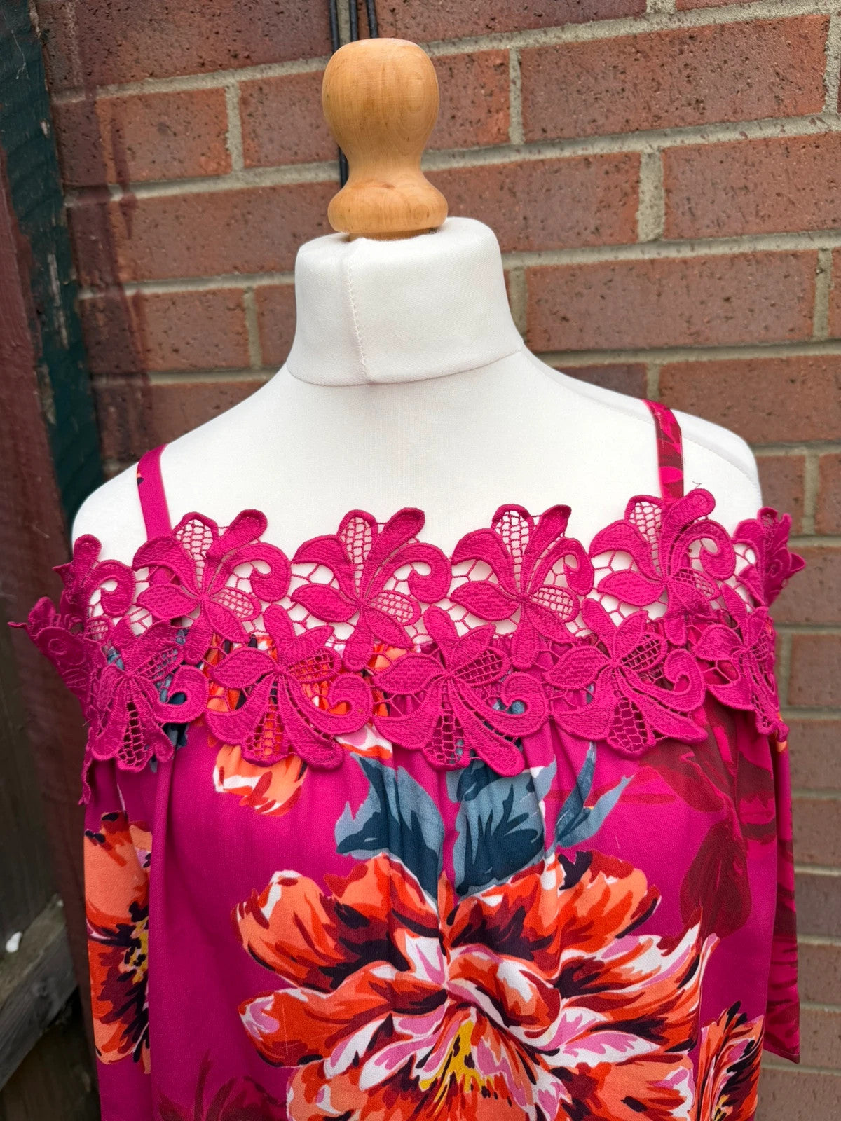 Soon multi off-the-shoulder top with pink floral pattern and lace details.