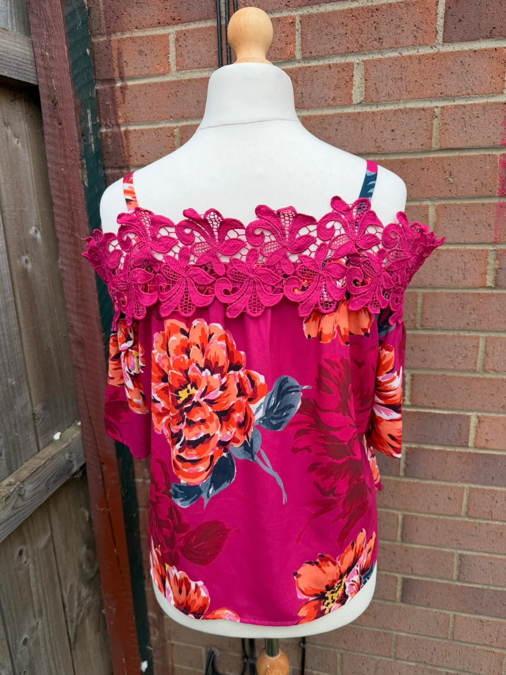 Soon multi off-the-shoulder top with pink floral pattern and lace details.