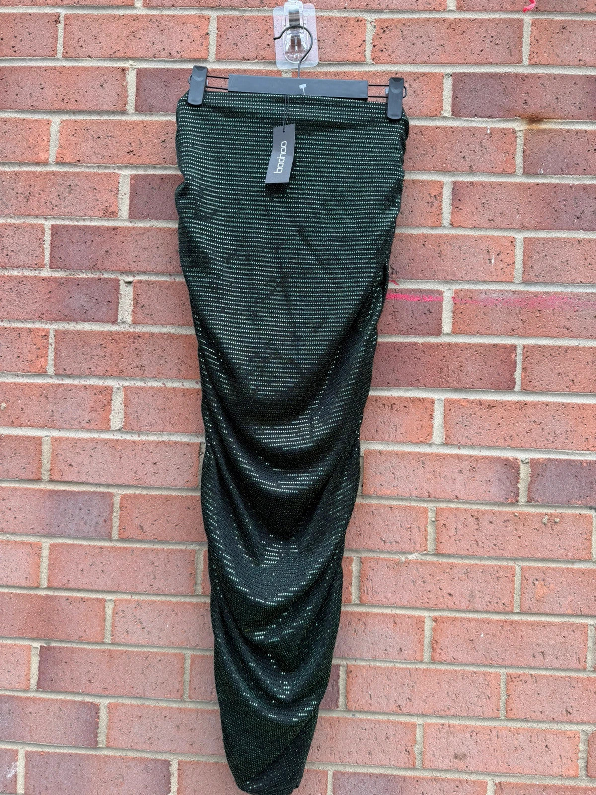 Boohoo green glitter midi skirt with ruched design and new with tags.