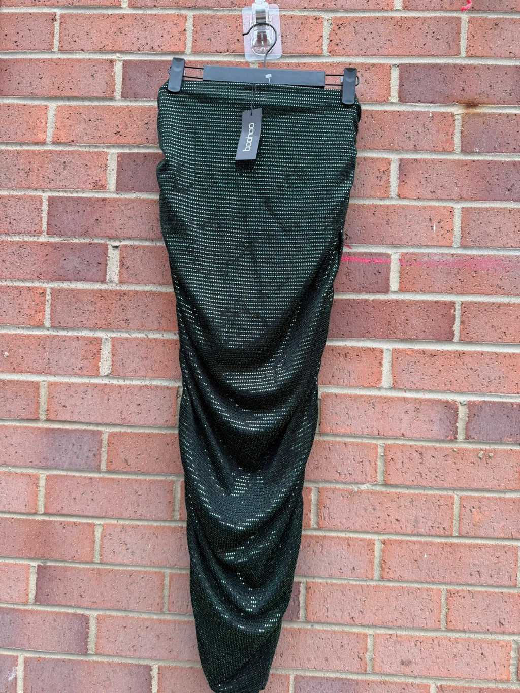 Boohoo green glitter midi skirt with ruched design and new with tags.