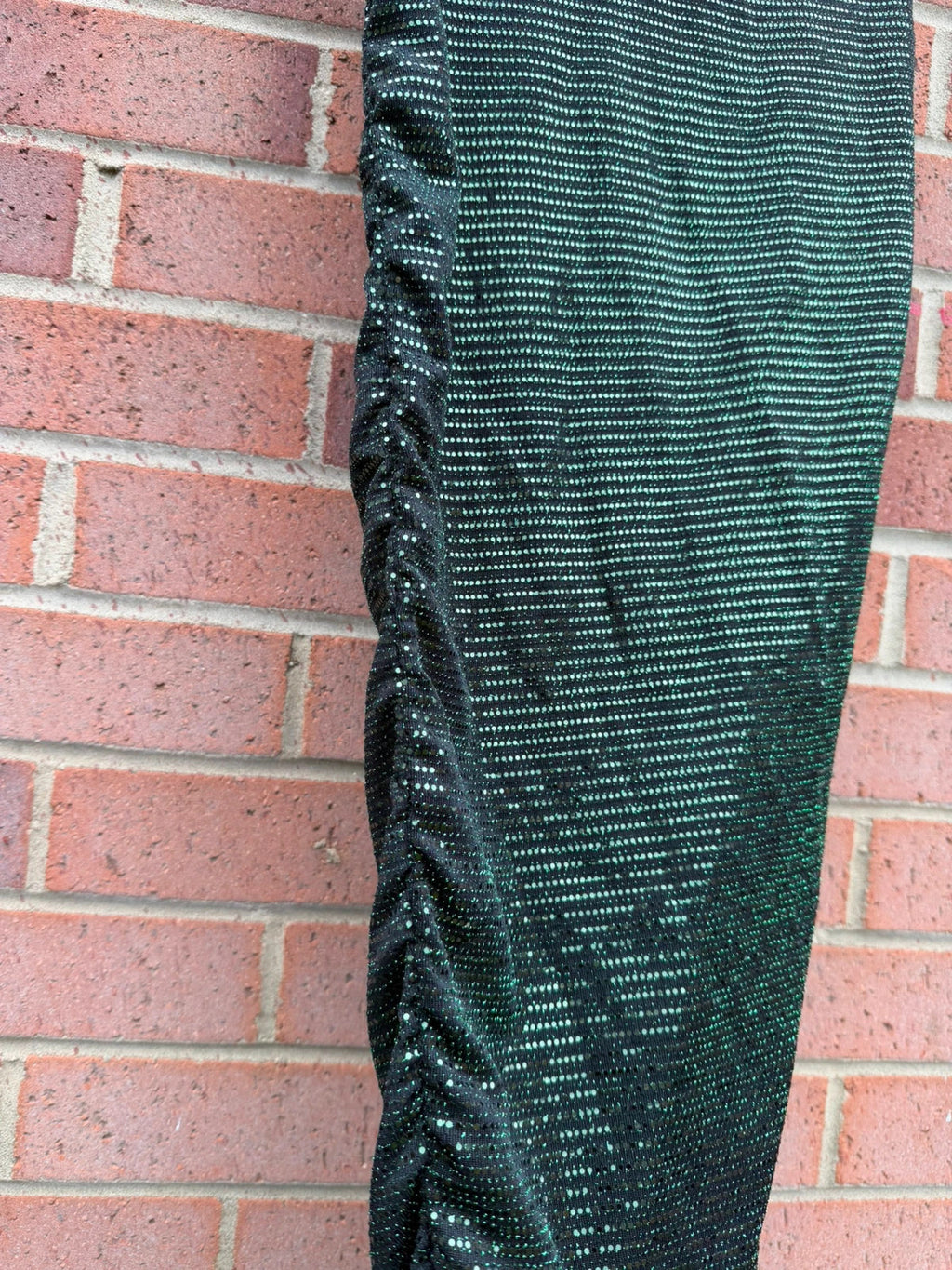 Boohoo green glitter midi skirt with ruched design and new with tags.