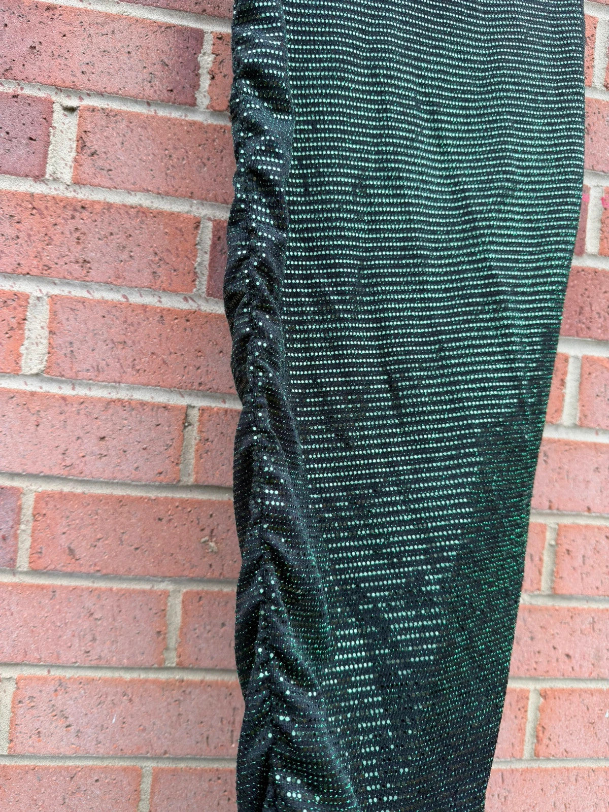 Boohoo green glitter midi skirt with ruched design and new with tags.
