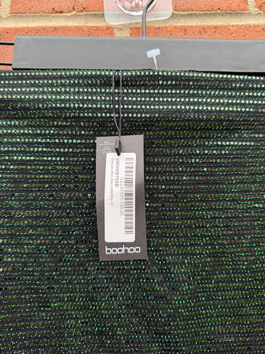 Boohoo green glitter midi skirt with ruched design and new with tags.