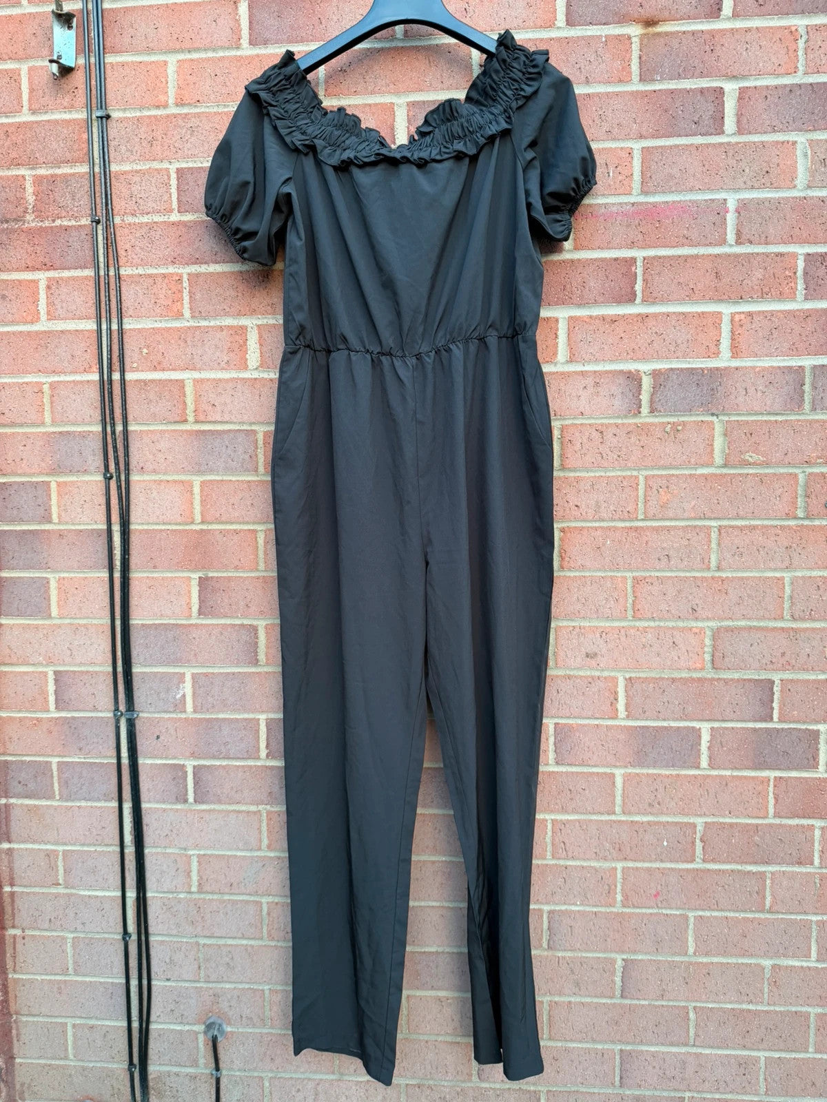 SHEIN black jumpsuit with puff sleeves and wide legs, cottagecore milkmaid style.