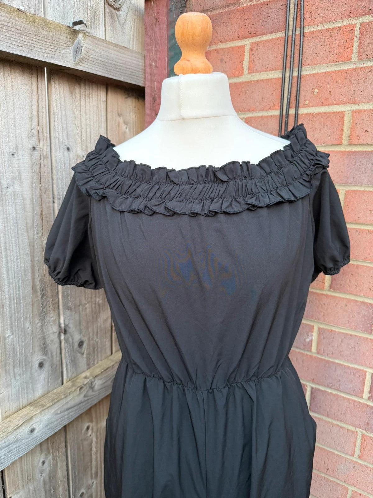 SHEIN black jumpsuit with puff sleeves and wide legs, cottagecore milkmaid style.