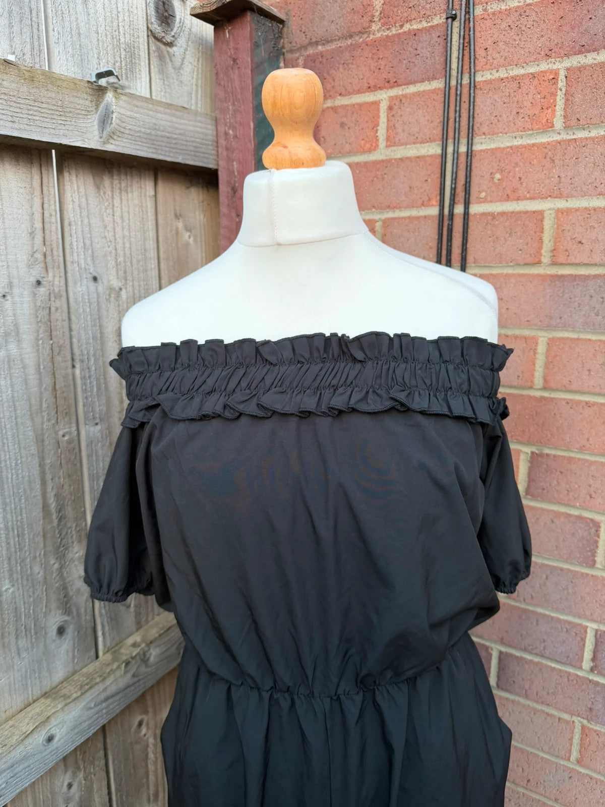 SHEIN black jumpsuit with puff sleeves and wide legs, cottagecore milkmaid style.