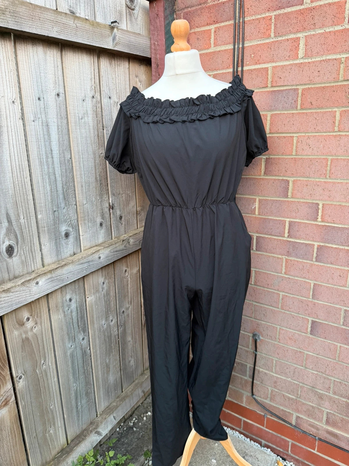 SHEIN black jumpsuit with puff sleeves and wide legs, cottagecore milkmaid style.