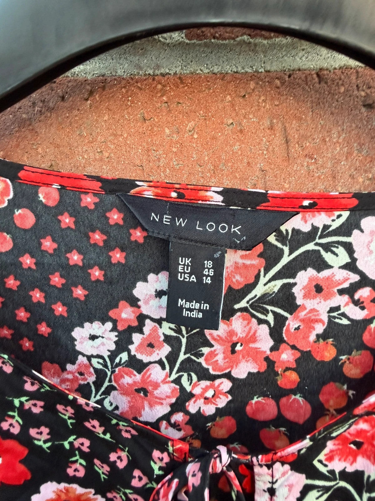 New Look multi floral tea dress with skater style and linen material.