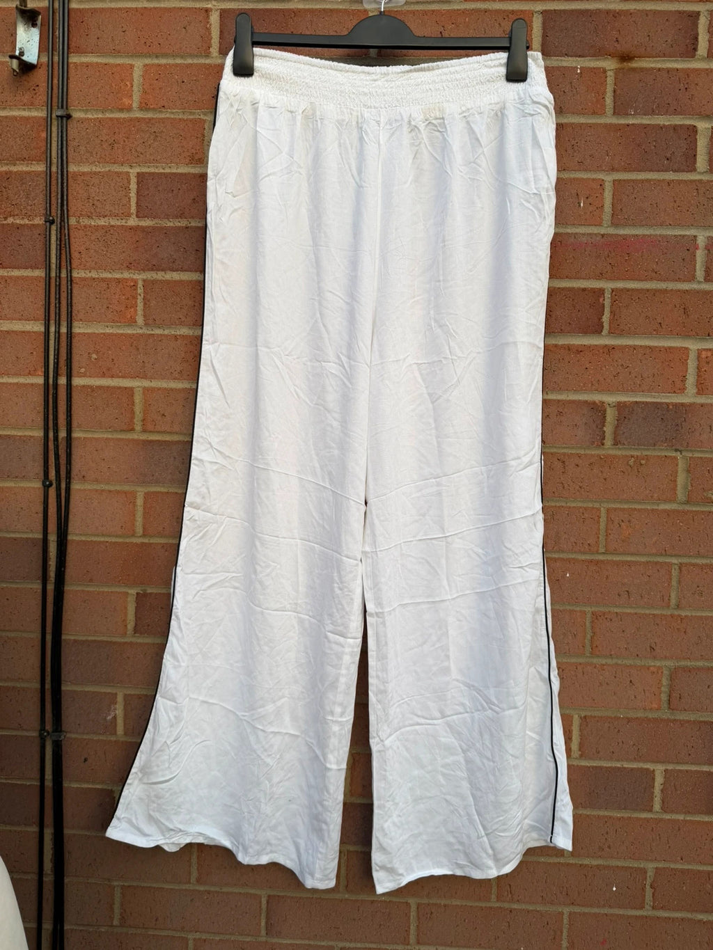 ASOS DESIGN white wide leg palazzo trousers linen look, perfect for summer holiday style.