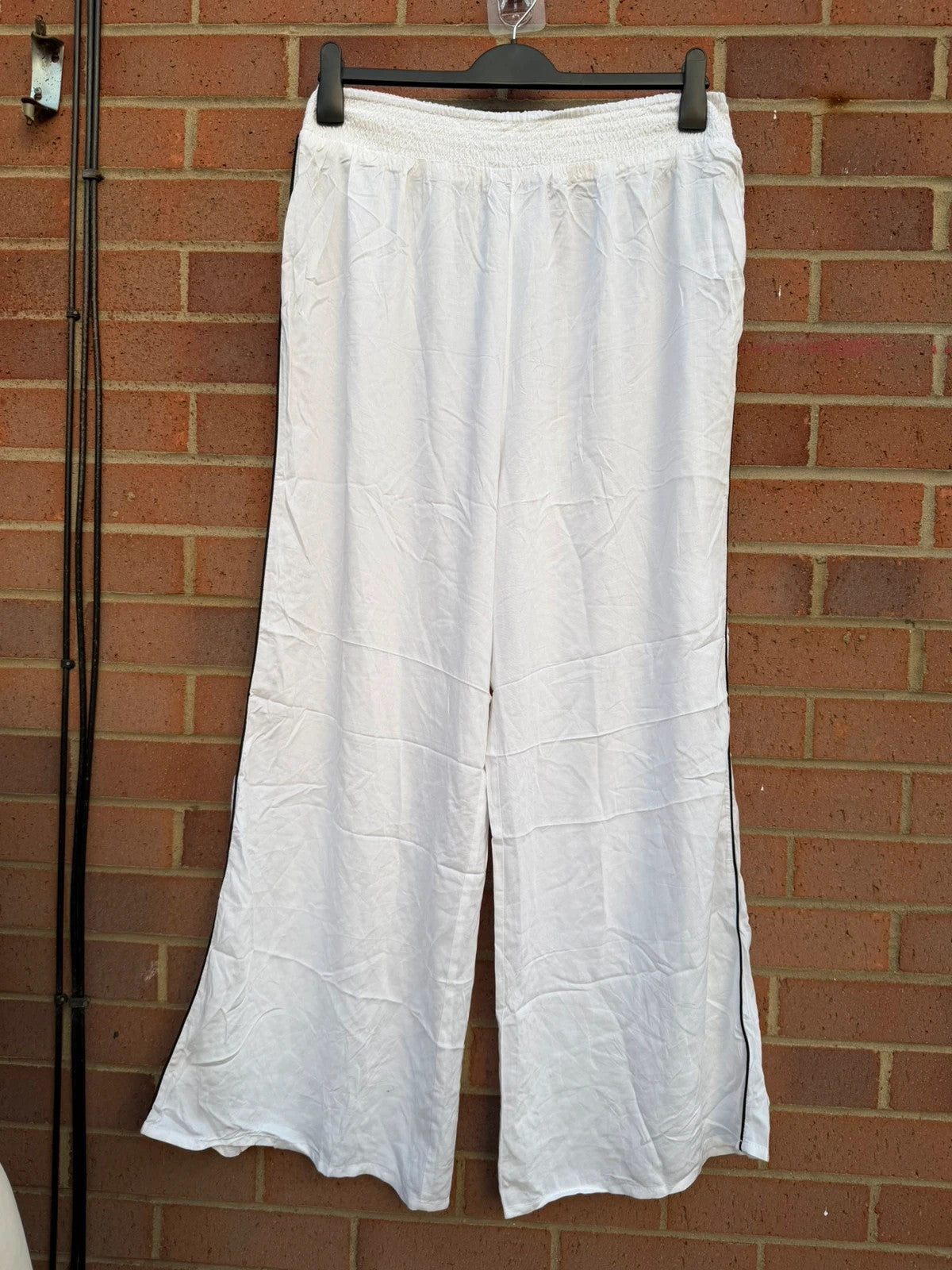 ASOS DESIGN white wide leg palazzo trousers linen look, perfect for summer holiday style.
