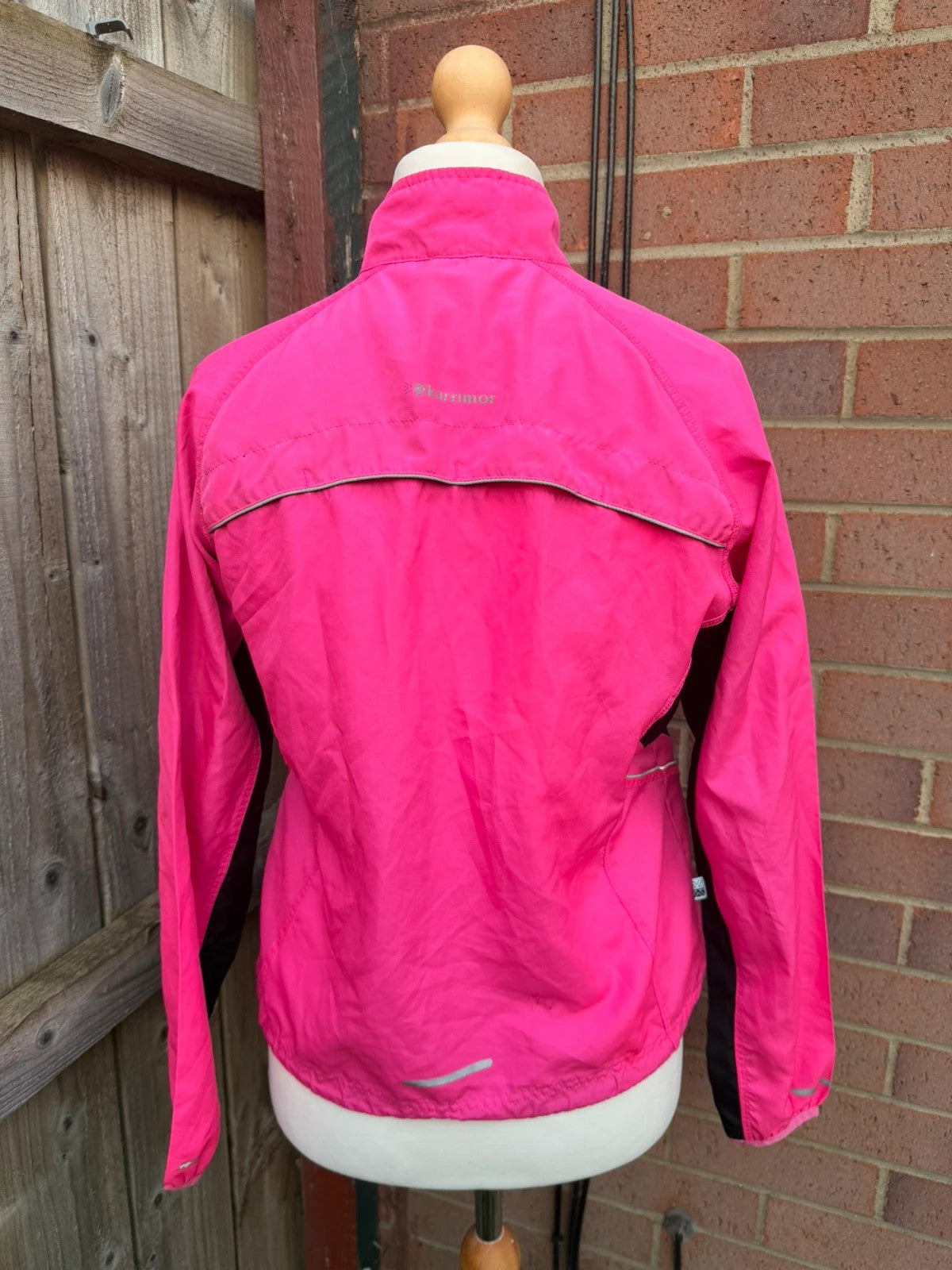 Karrimor pink ski suit zip-up with visible stain, perfect for gorpcore style.