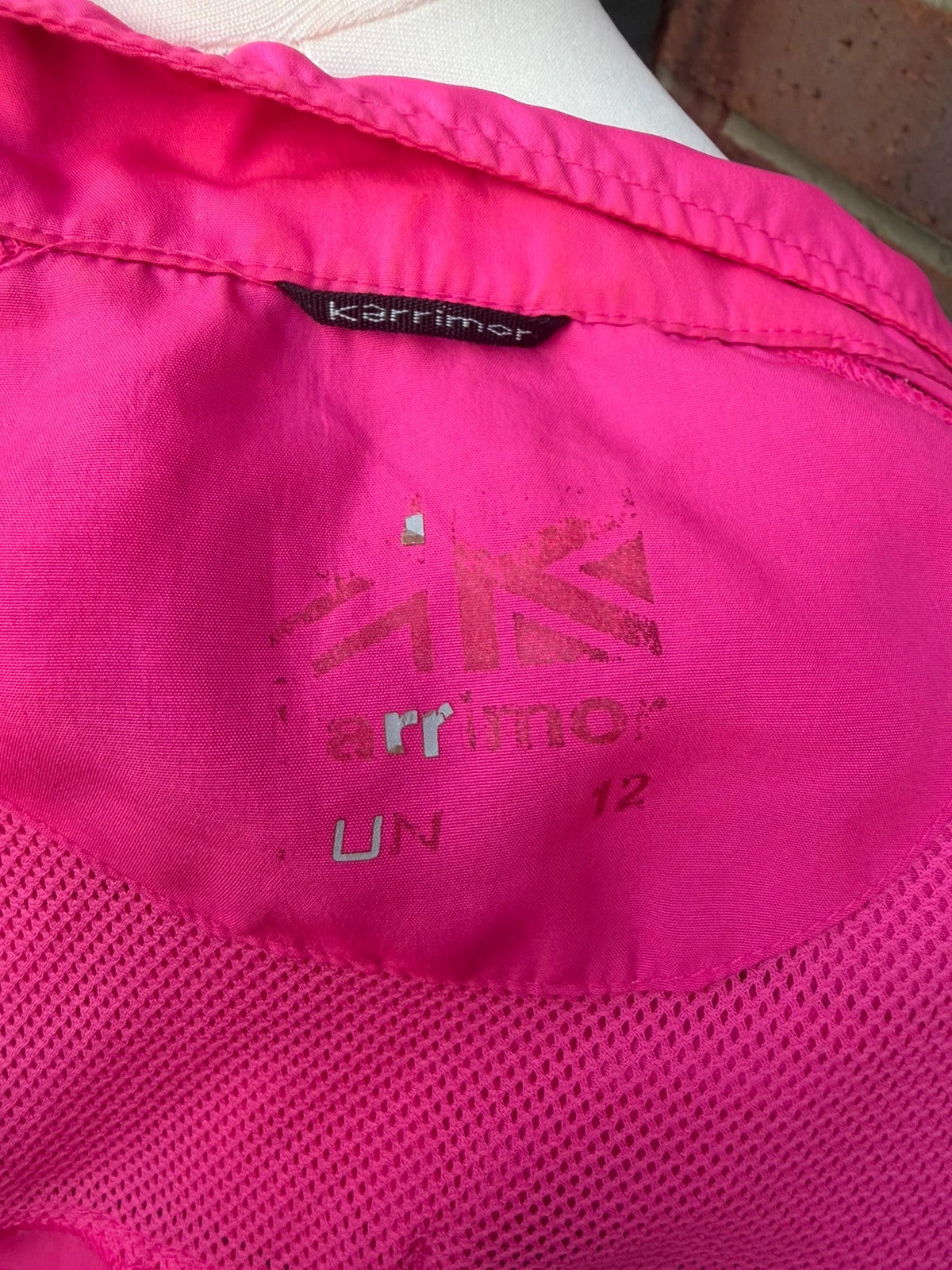Karrimor pink ski suit zip-up with visible stain, perfect for gorpcore style.