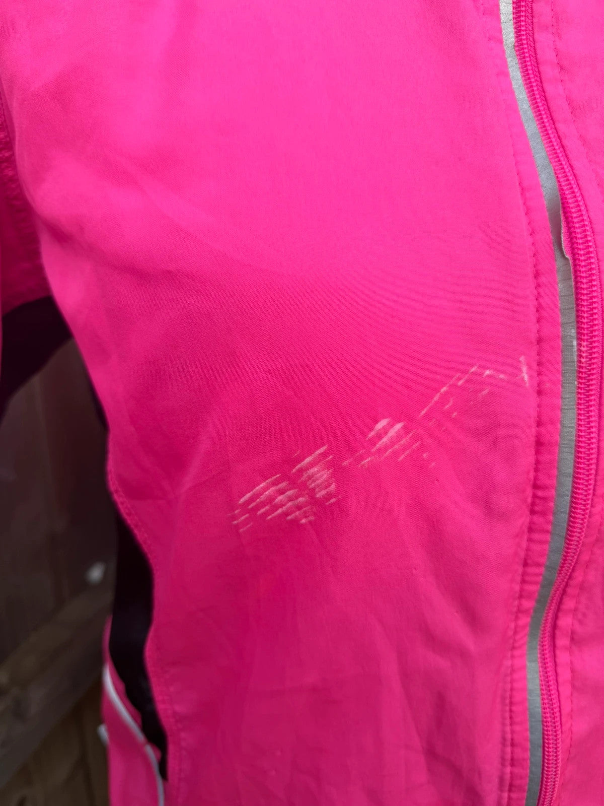 Karrimor pink ski suit zip-up with visible stain, perfect for gorpcore style.