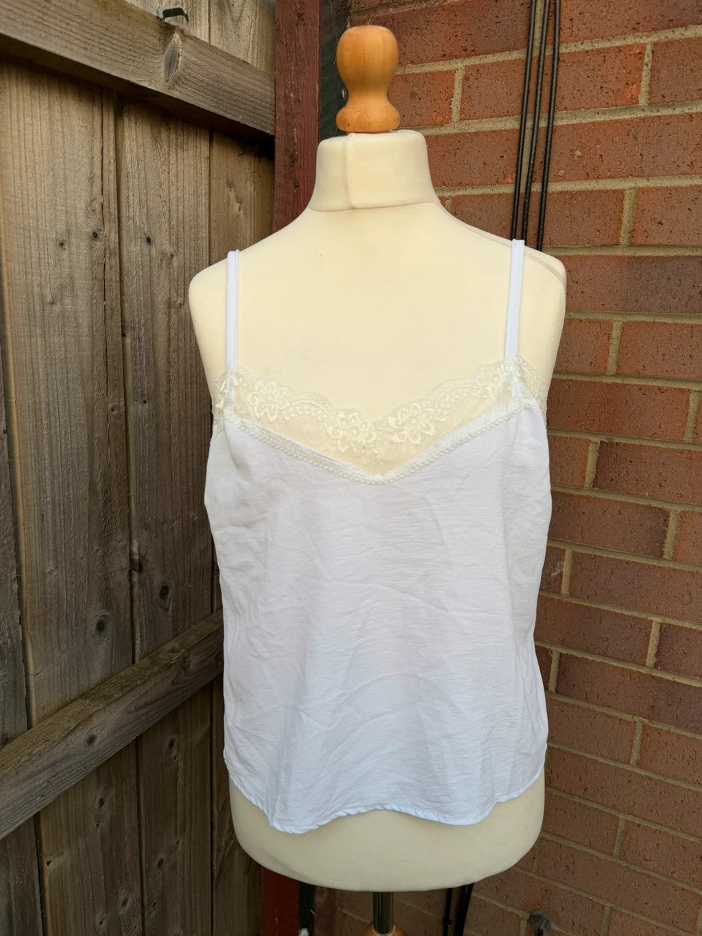 Be You white singlet with lace trim and new with tags.