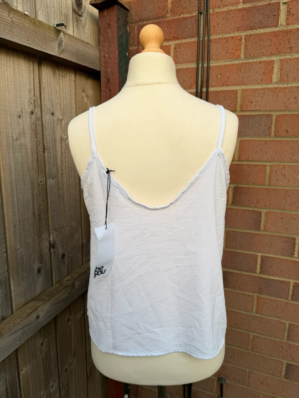 Be You white singlet with lace trim and new with tags.