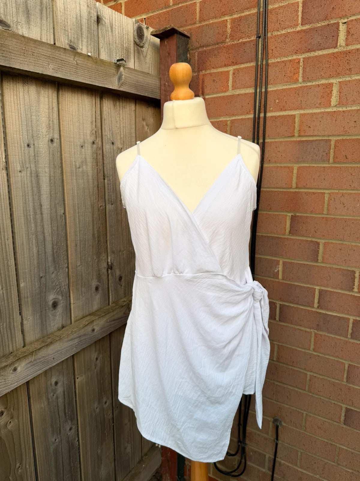 Be You white linen wrap mini dress with satin look and tags attached.