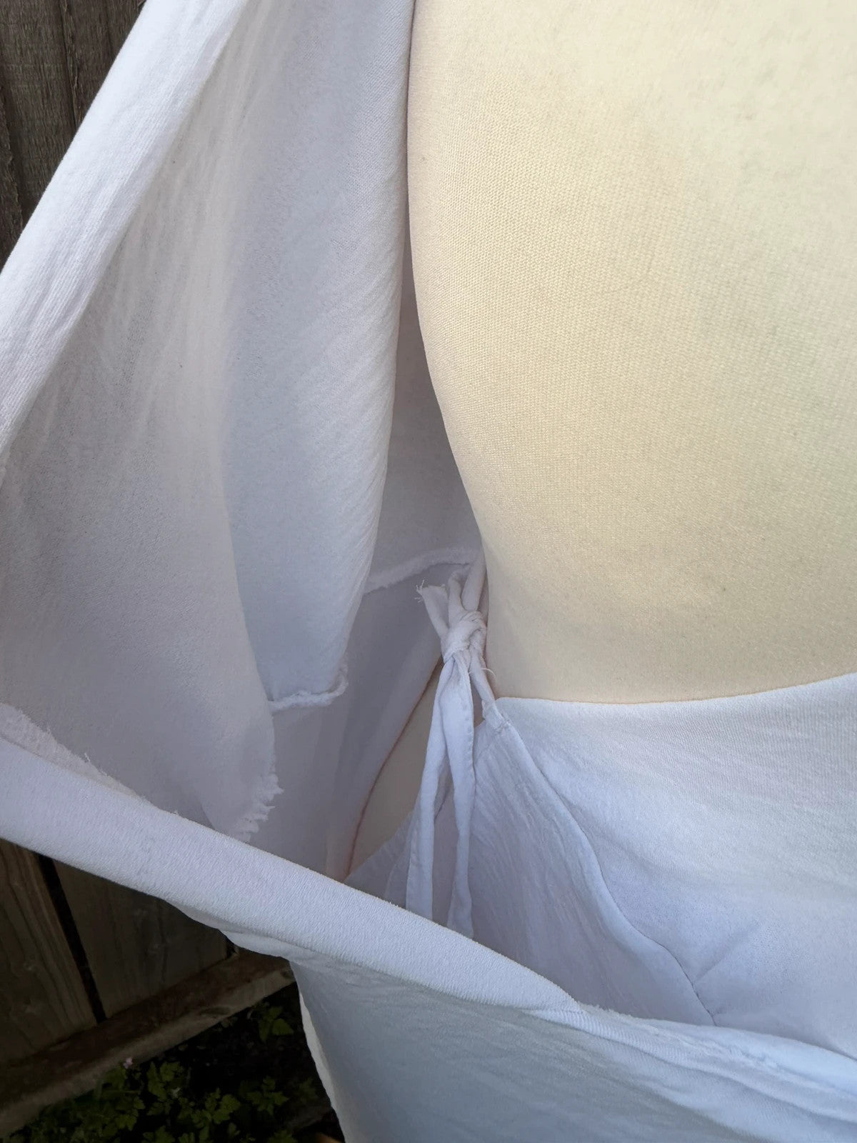 Be You white linen wrap mini dress with satin look and tags attached.