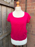 Dorothy Perkins pink pocket t-shirt with scoop neck and casual Y2K style.