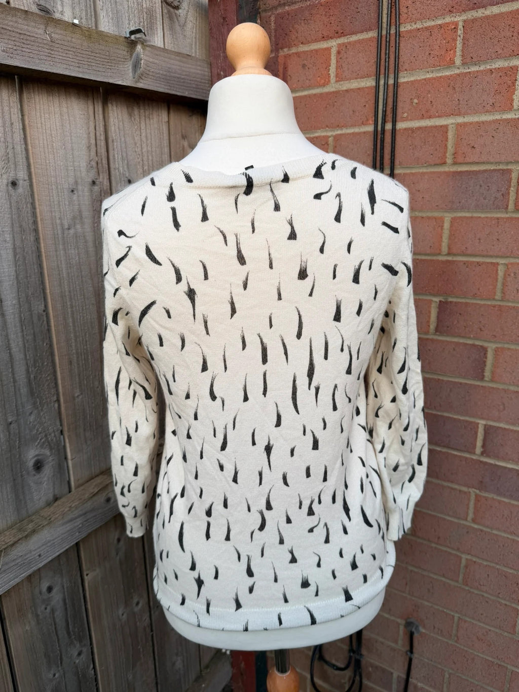 Jaeger black and white abstract print lightweight knit jumper with minimalist design.