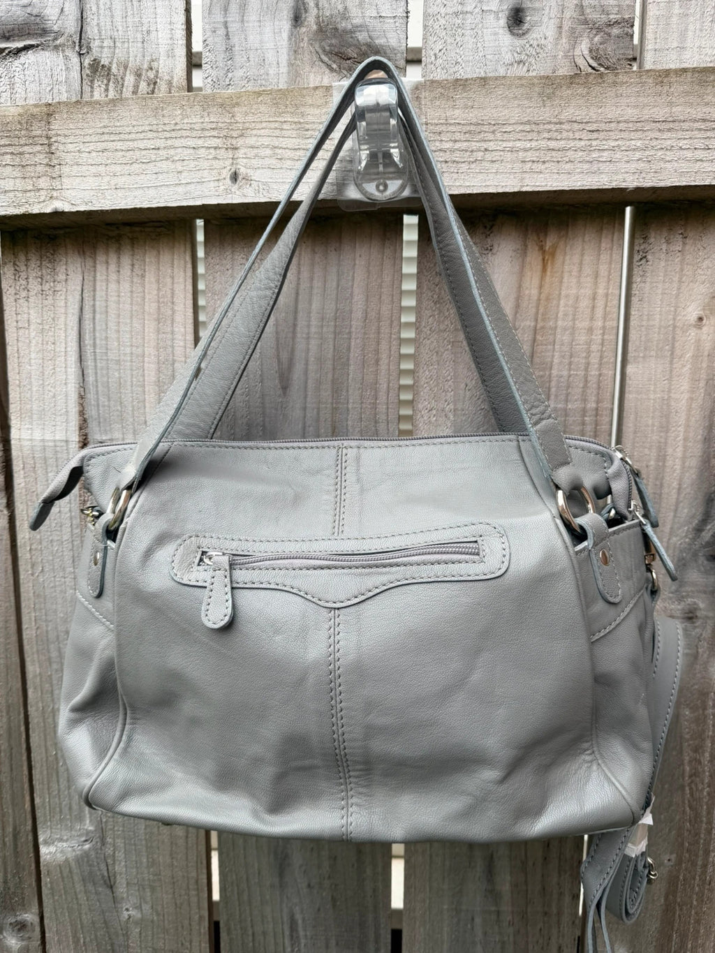 Totes grey leather shoulder bag with minimalist design and new with tags.