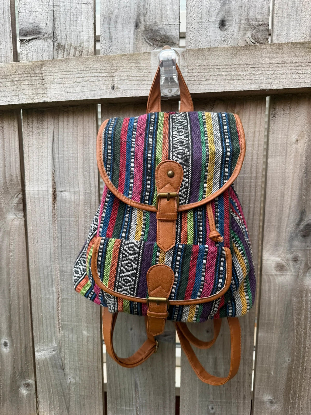 Vintage multi mini backpack with Aztec stripe pattern and festival-inspired design.
