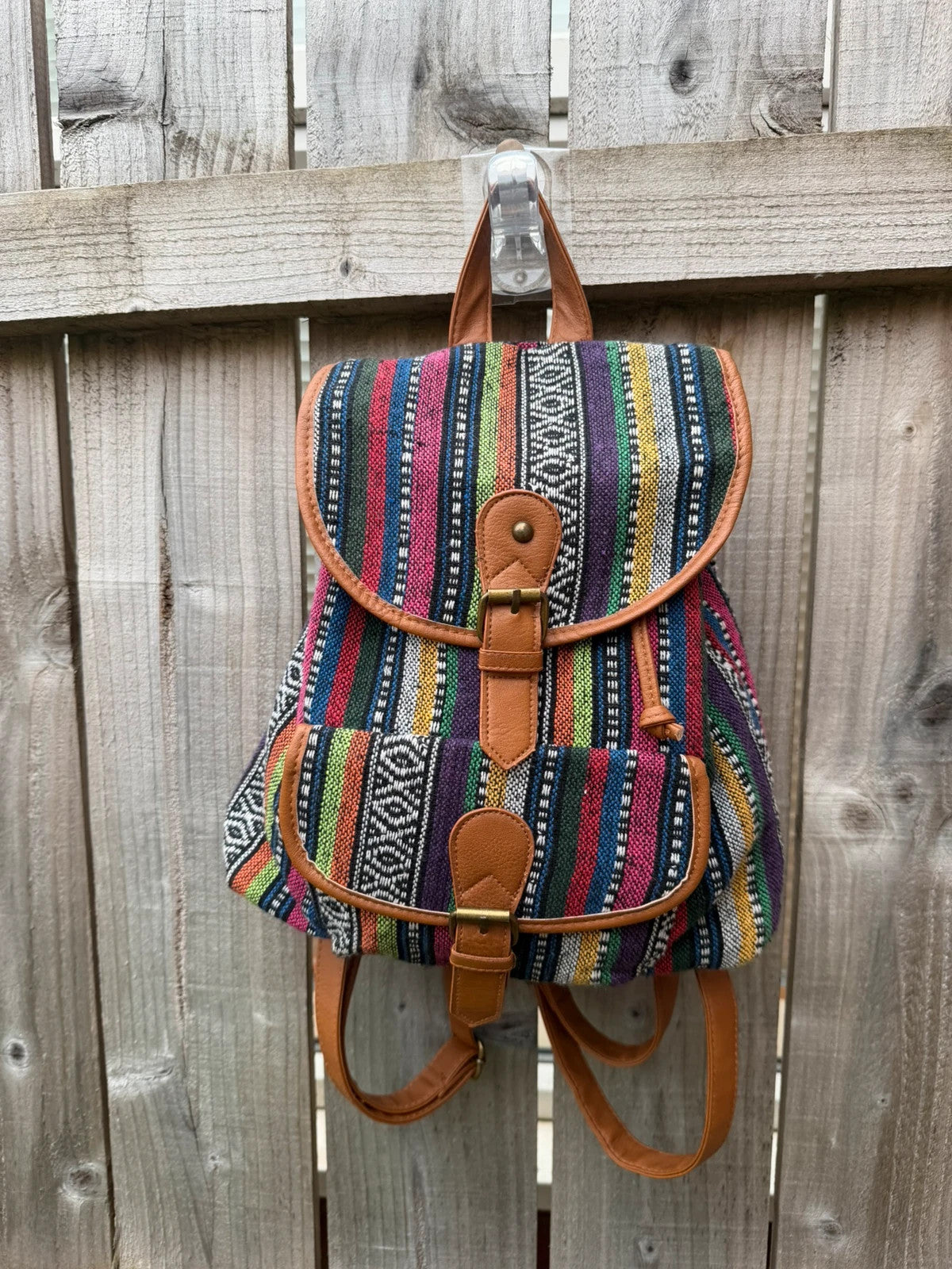 Vintage multi mini backpack with Aztec stripe pattern and festival-inspired design.
