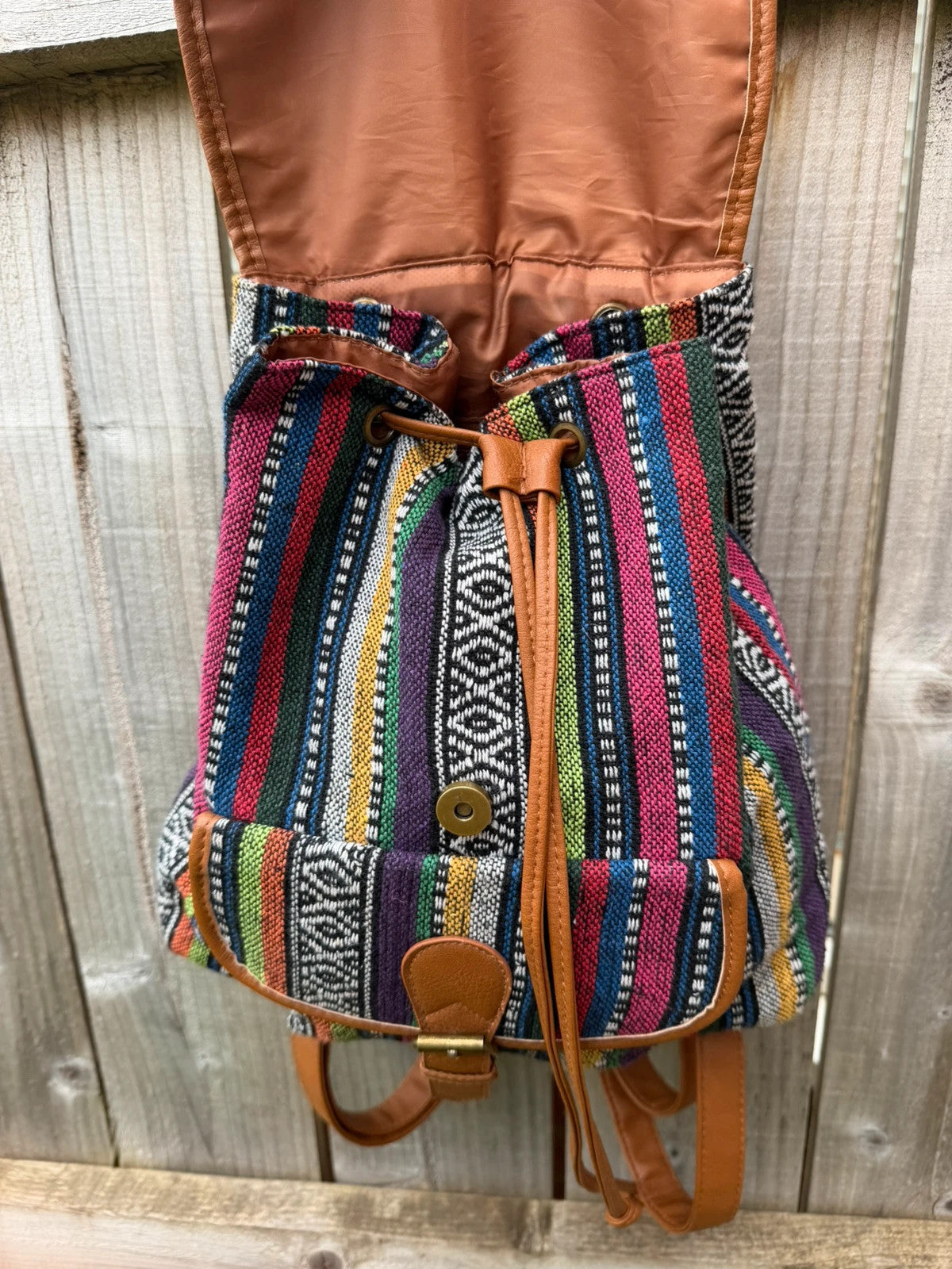Vintage multi mini backpack with Aztec stripe pattern and festival-inspired design.