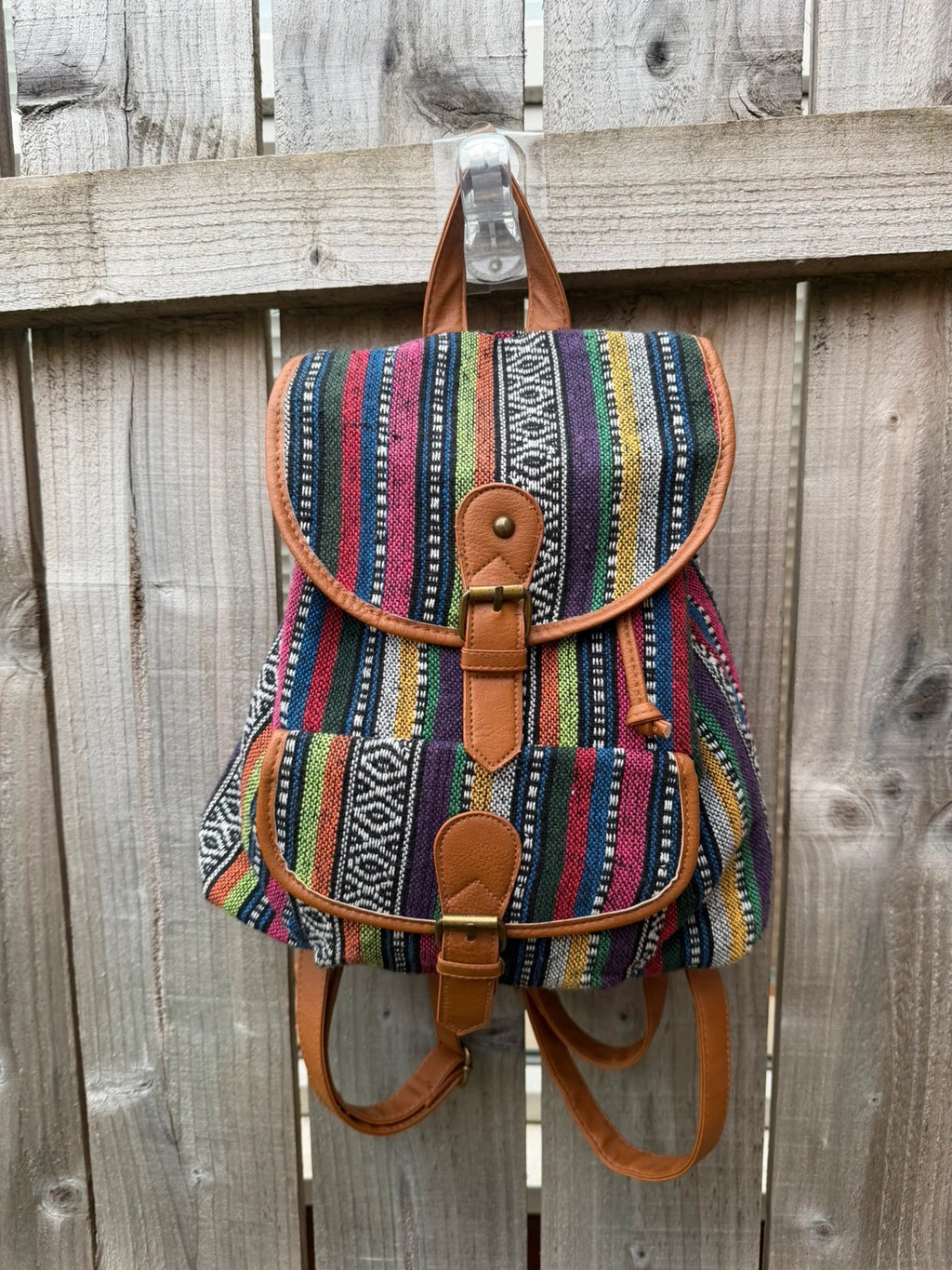 Vintage multi mini backpack with Aztec stripe pattern and festival-inspired design.