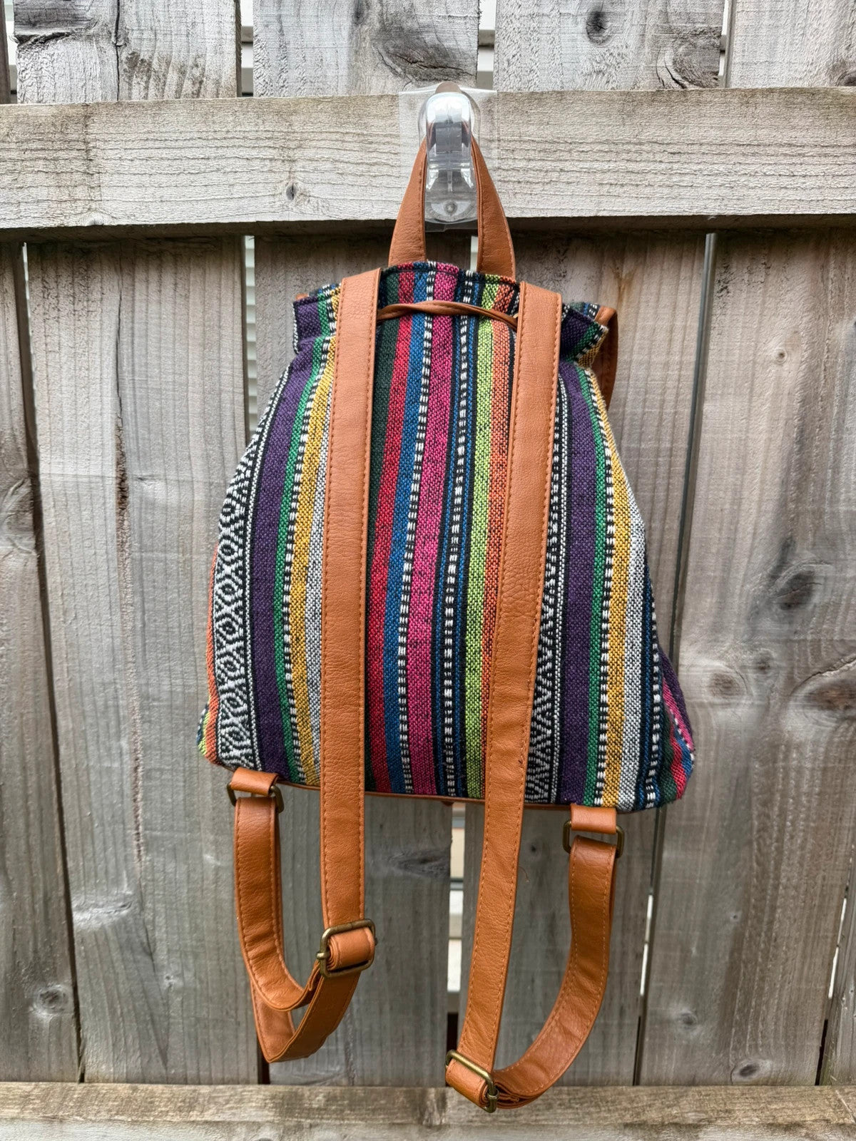 Vintage multi mini backpack with Aztec stripe pattern and festival-inspired design.