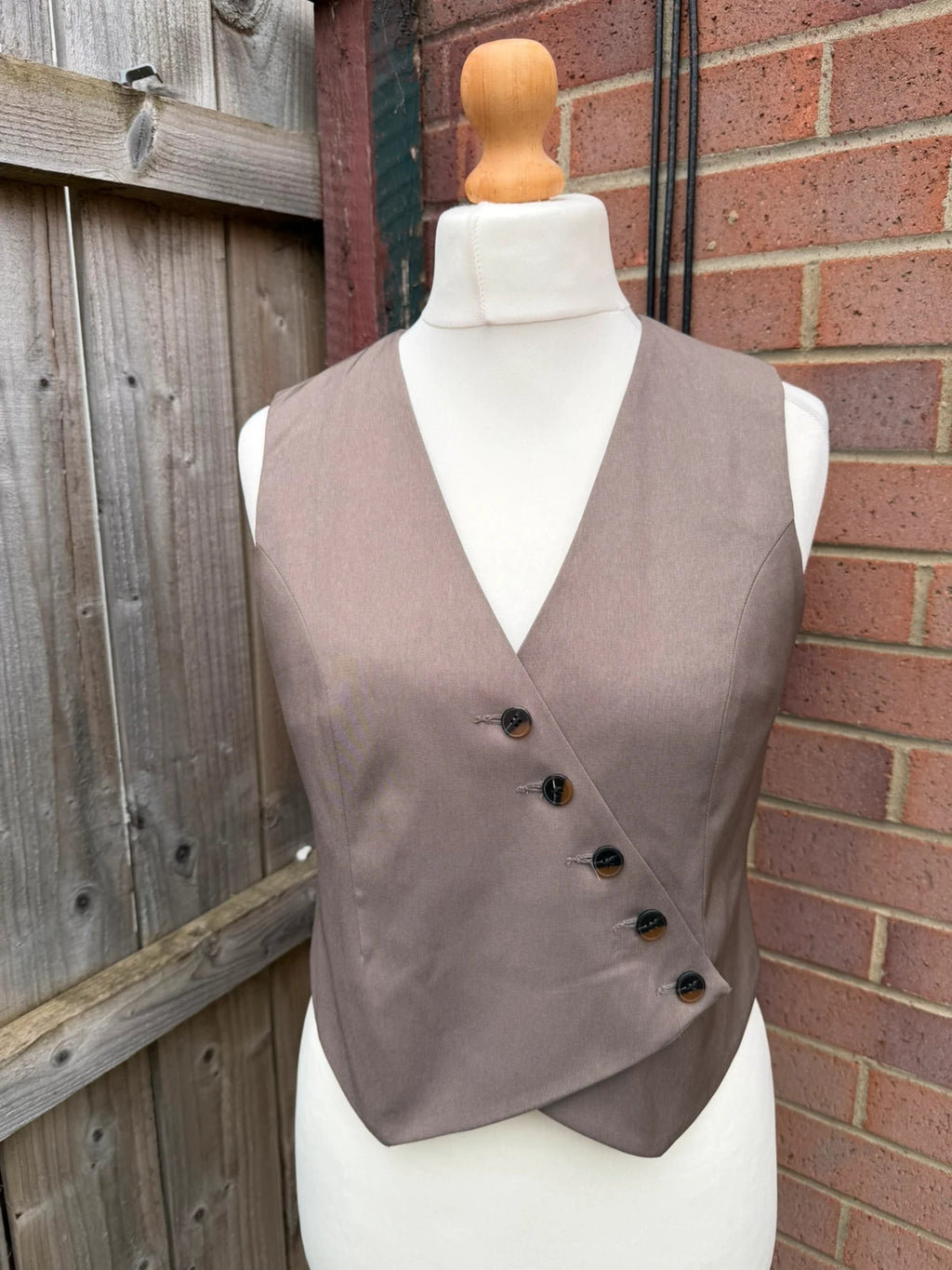 Primark beige tailored waistcoat with classic cut and vintage style details.