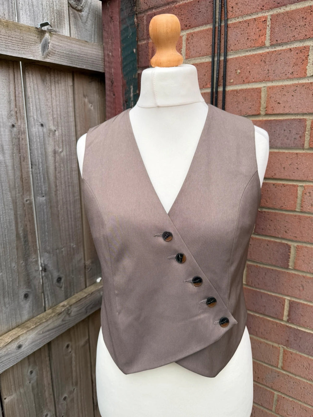 Primark beige tailored waistcoat with classic cut and vintage style details.