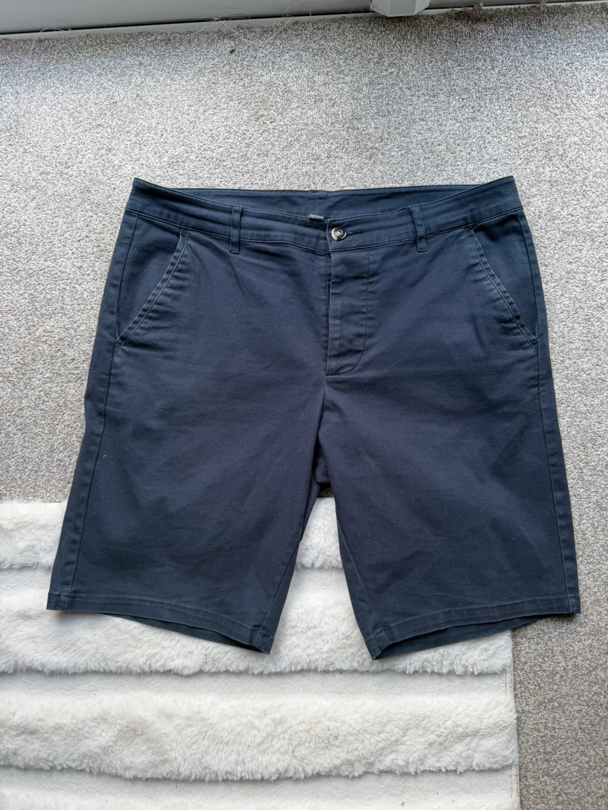 Chinos navy tailored shorts with clean lines and classic fit, pre-loved condition.