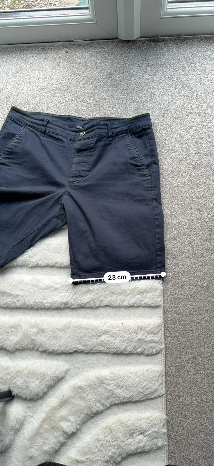 Chinos navy tailored shorts with clean lines and classic fit, pre-loved condition.
