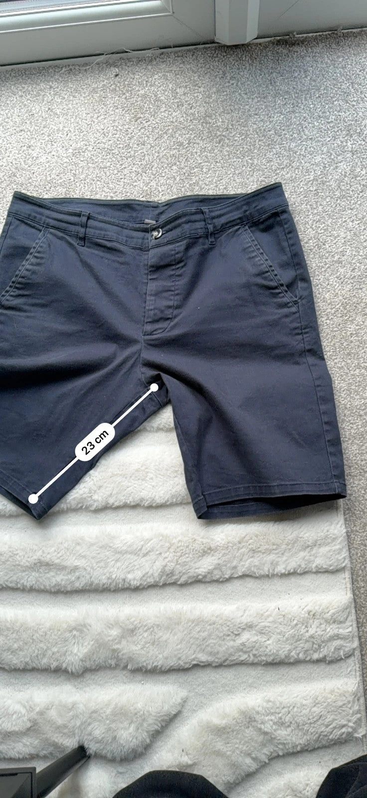 Chinos navy tailored shorts with clean lines and classic fit, pre-loved condition.