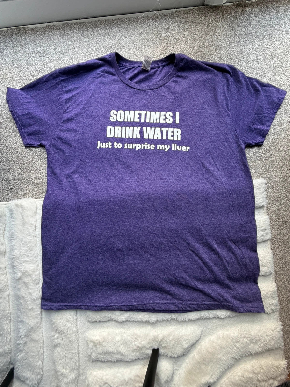 Fruit of the Loom purple graphic t-shirt with casual oversized fit and unique design.
