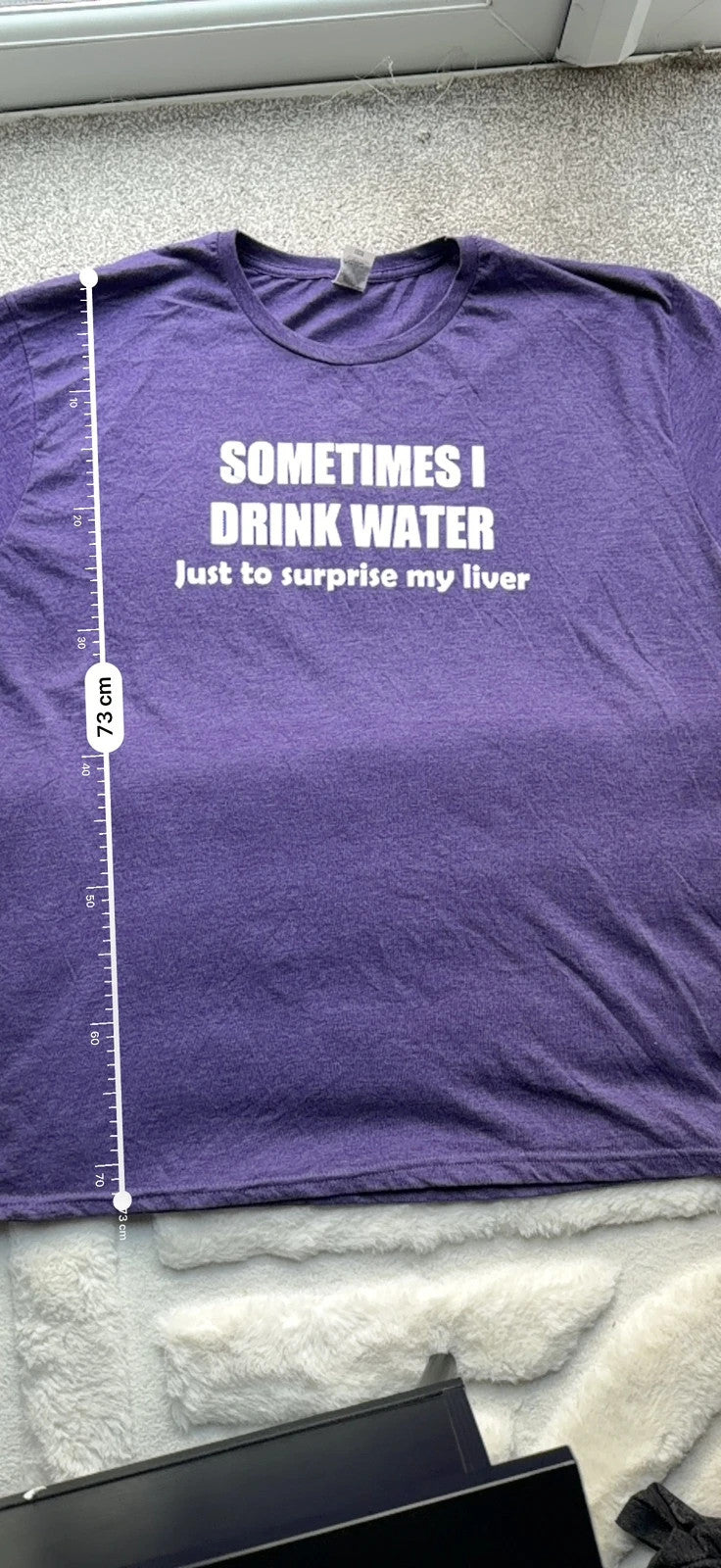 Fruit of the Loom purple graphic t-shirt with casual oversized fit and unique design.