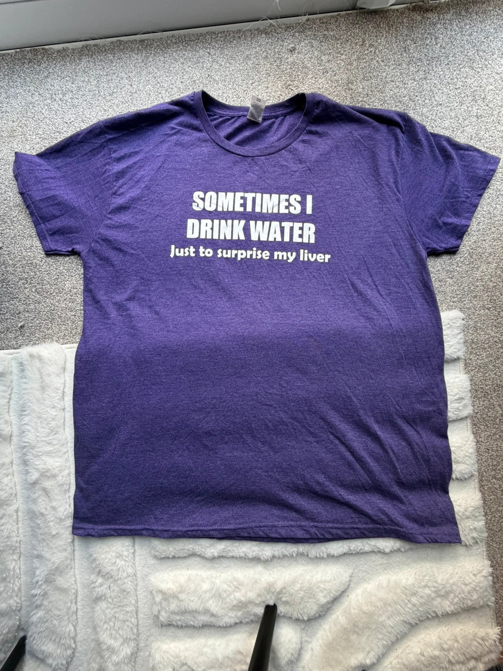 Fruit of the Loom purple graphic t-shirt with casual oversized fit and unique design.