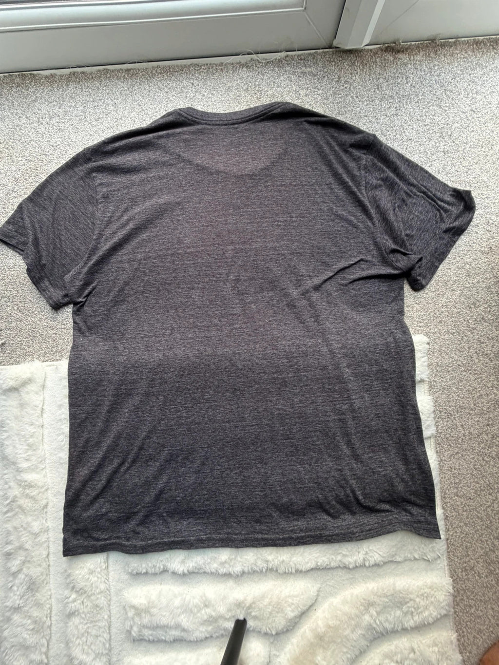 Blue 84 grey graphic tee featuring Miami Hurricanes logo and vintage design.