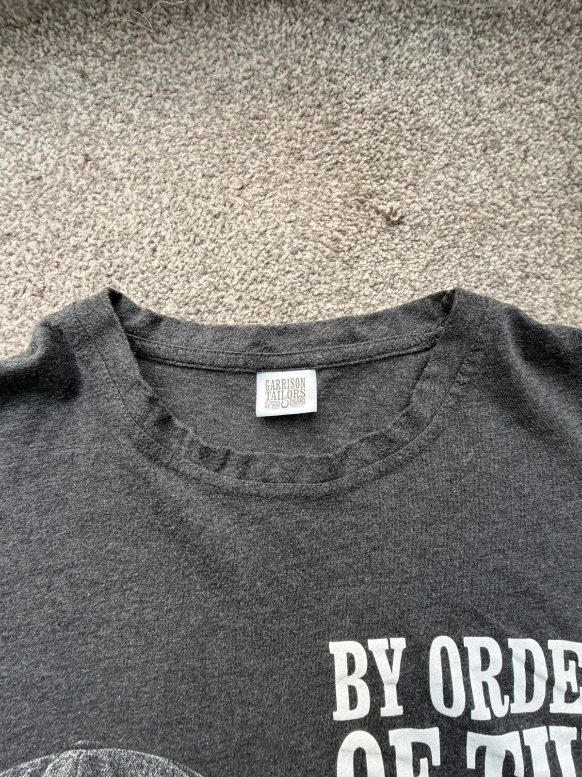 Garrison Tailor black and grey graphic tee featuring Peaky Blinders design and soft fabric.