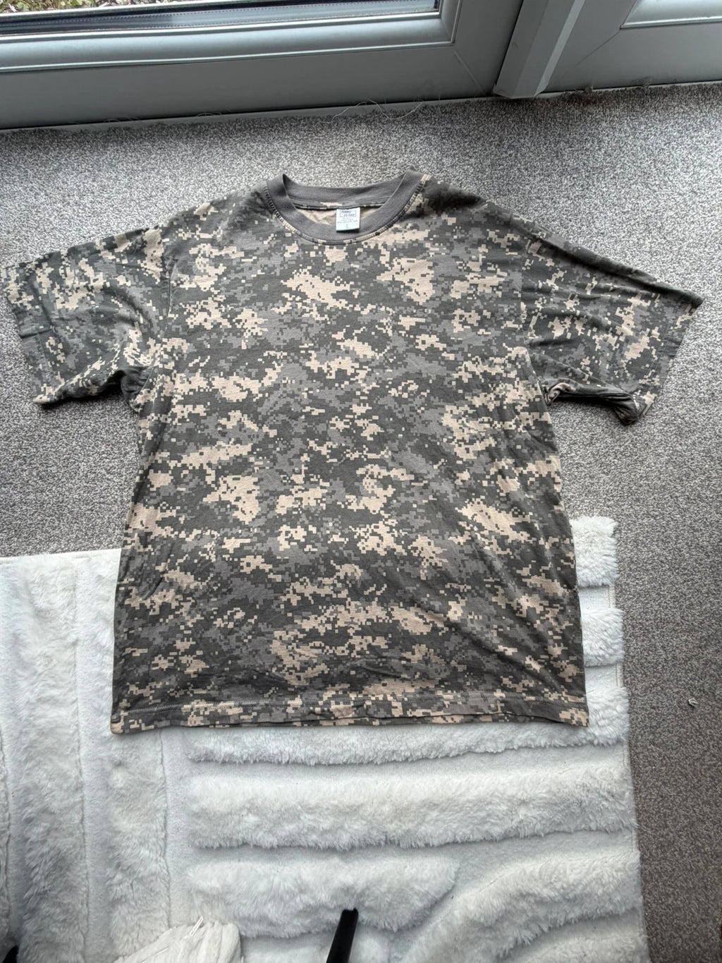 Army khaki graphic tee with camo pattern and streetwear style.