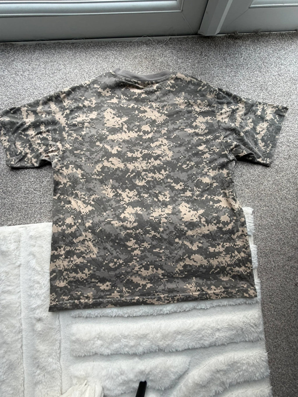 Army khaki graphic tee with camo pattern and streetwear style.