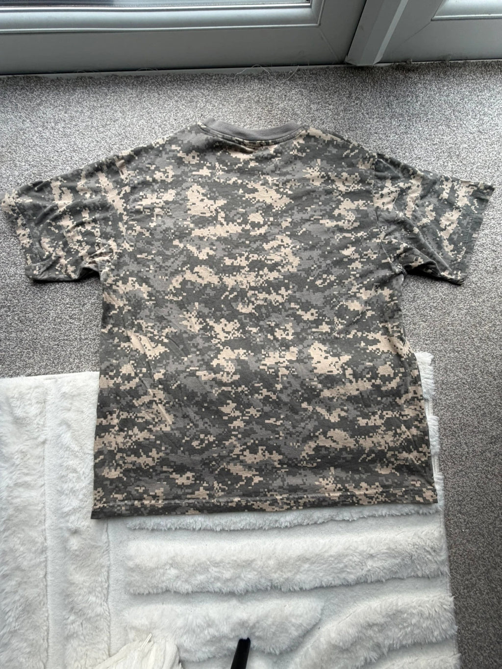 Army khaki graphic tee with camo pattern and streetwear style.