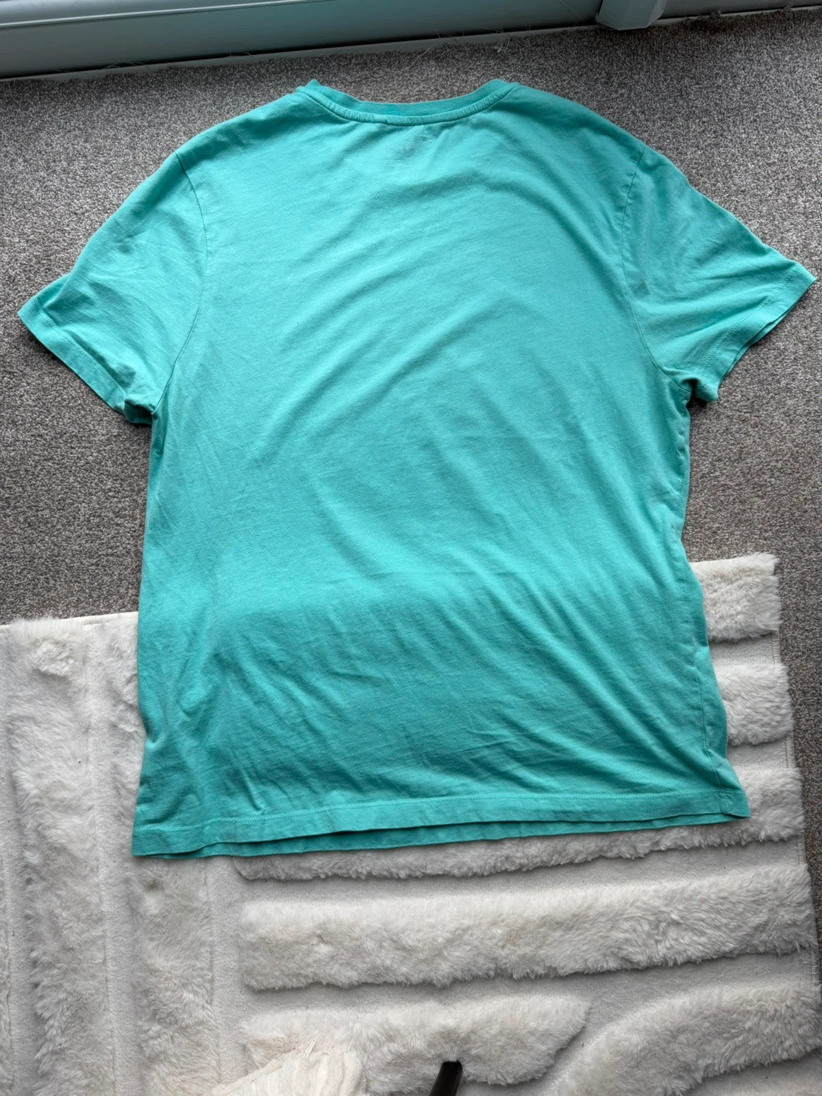 SpongeBob SquarePants blue and green graphic tee featuring cartoon print and vintage Y2K style.