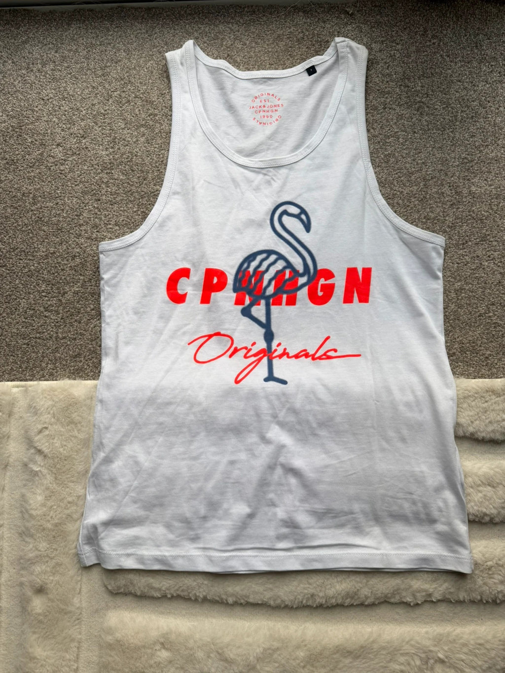 Jack & Jones white sleeveless vest, new without tags, minimalist design.
