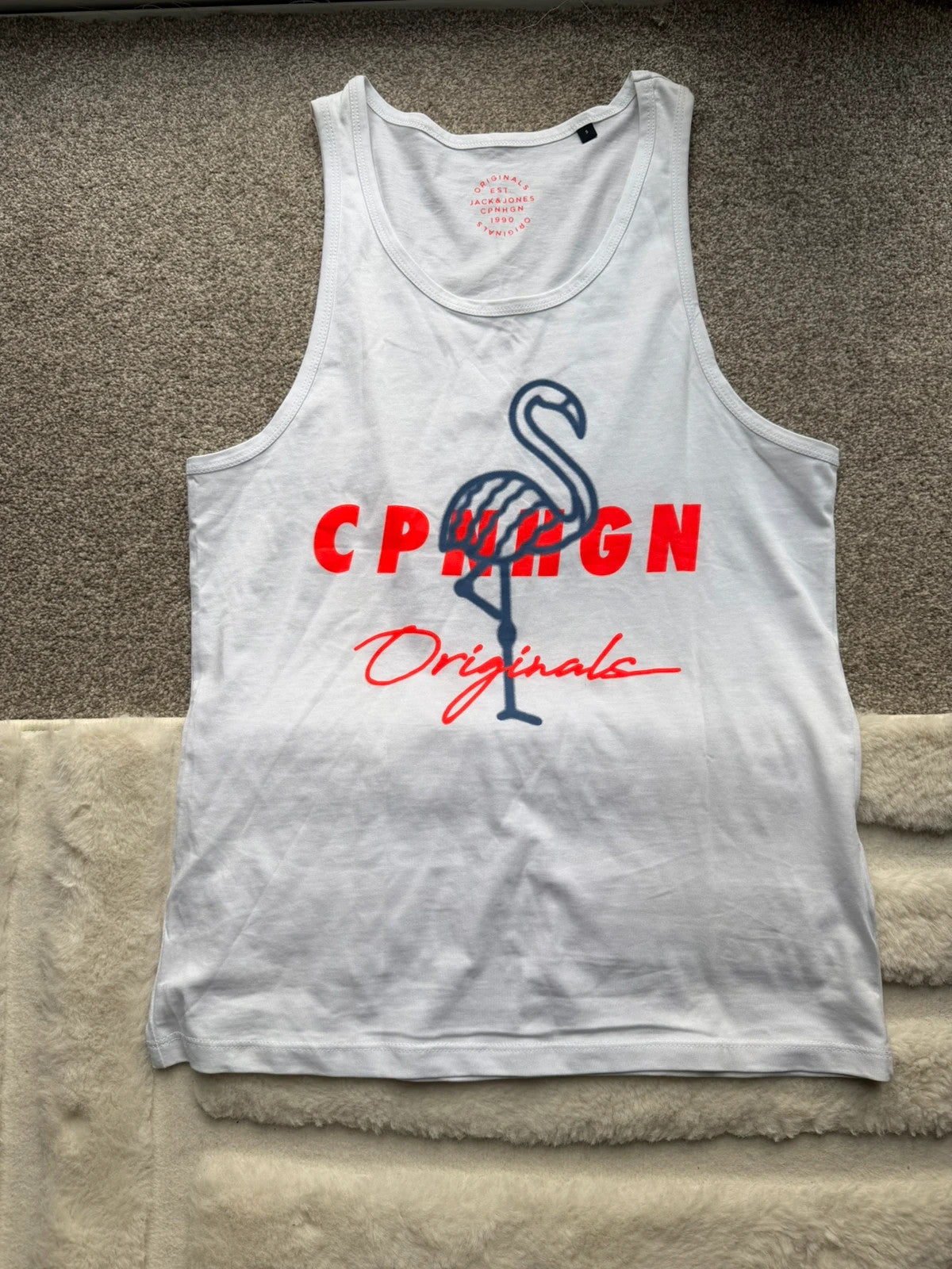 Jack & Jones white sleeveless vest, new without tags, minimalist design.
