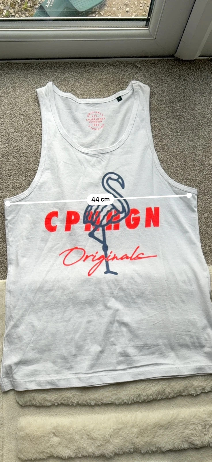 Jack & Jones white sleeveless vest, new without tags, minimalist design.