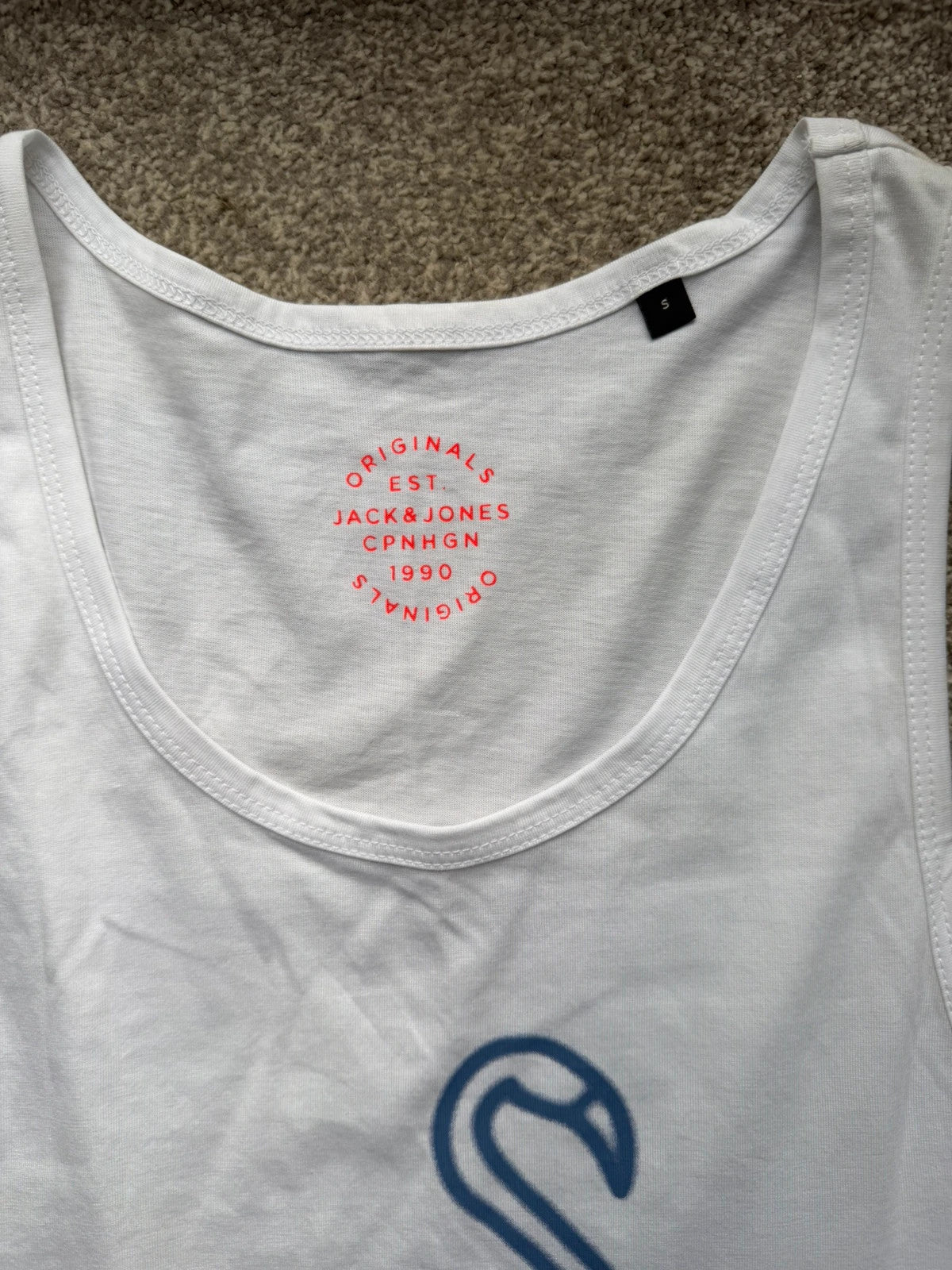 Jack & Jones white sleeveless vest, new without tags, minimalist design.