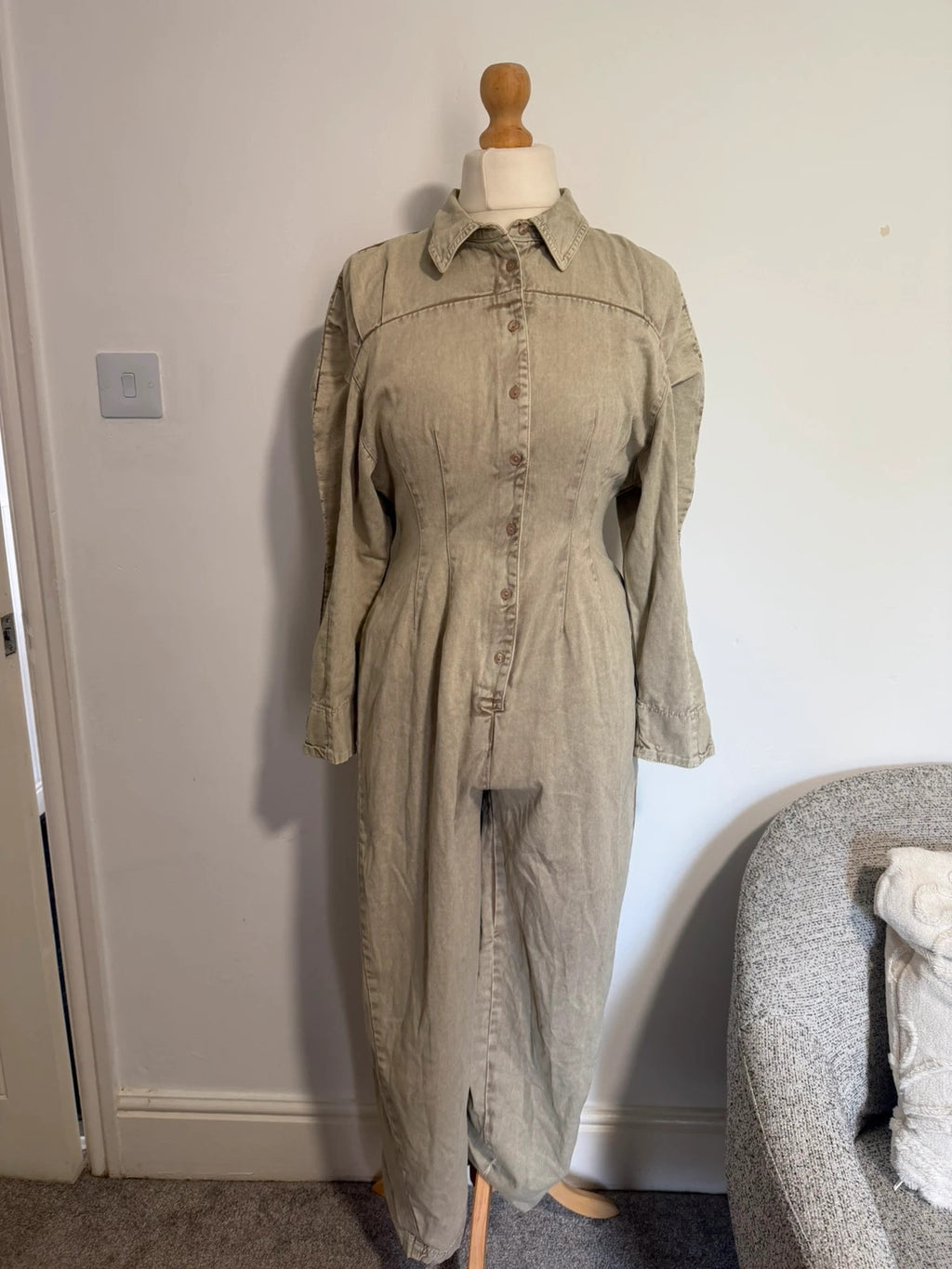 COLLUSION khaki denim jumpsuit with relaxed fit and minimalist design.
