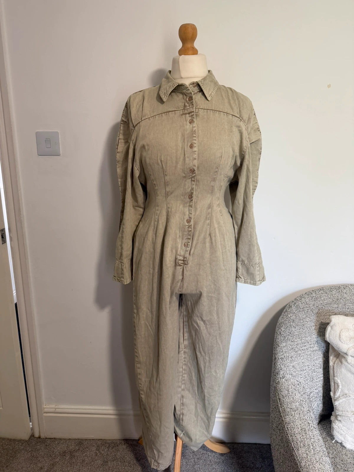 COLLUSION khaki denim jumpsuit with relaxed fit and minimalist design.